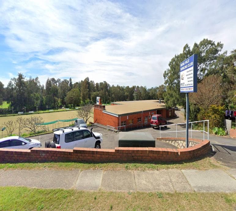 Edway Training and Training Aid's Mona Vale venue: the Mona Vale Bowling Club sign, car park and bowling greens, with the clubhouse behind.